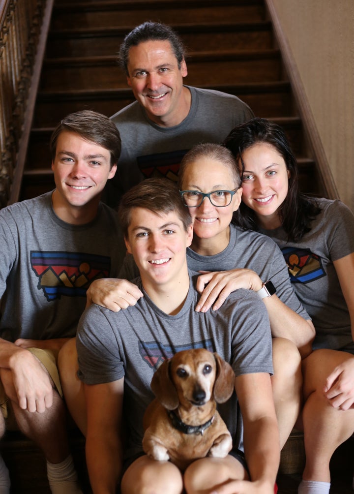 <p>A family bond of powerful love - With her husband Don, their daughter Claire, sons Louis and Oscar and beloved dog Bilbo.</p>