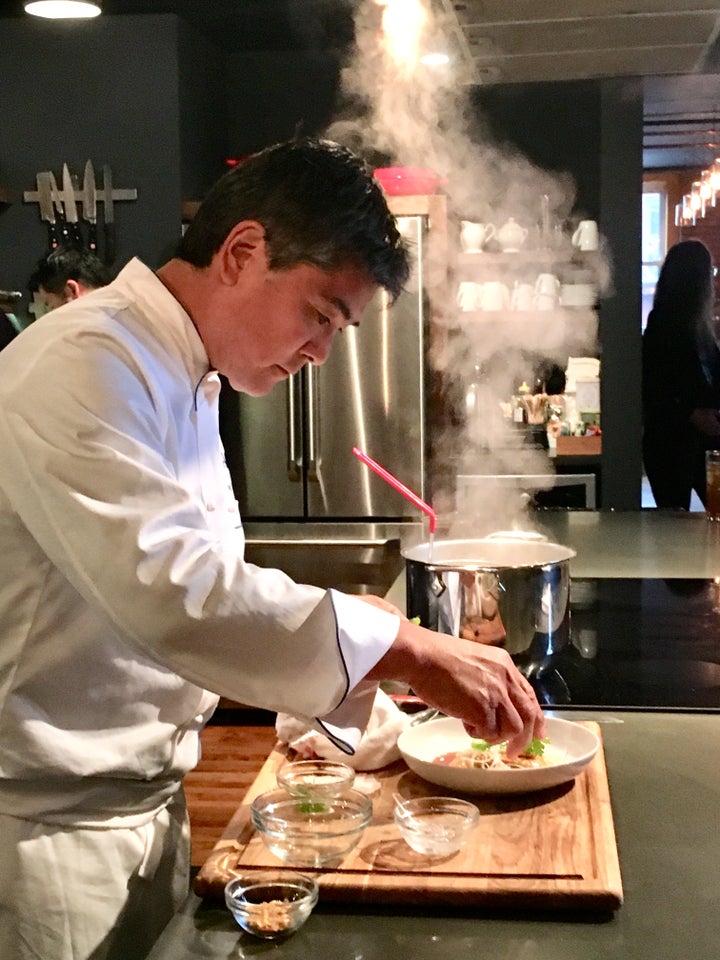 Chef Roy Yamaguchi prepares lobster fried rice for his MSC Seaside Restaurant, Asian Market Kitchen