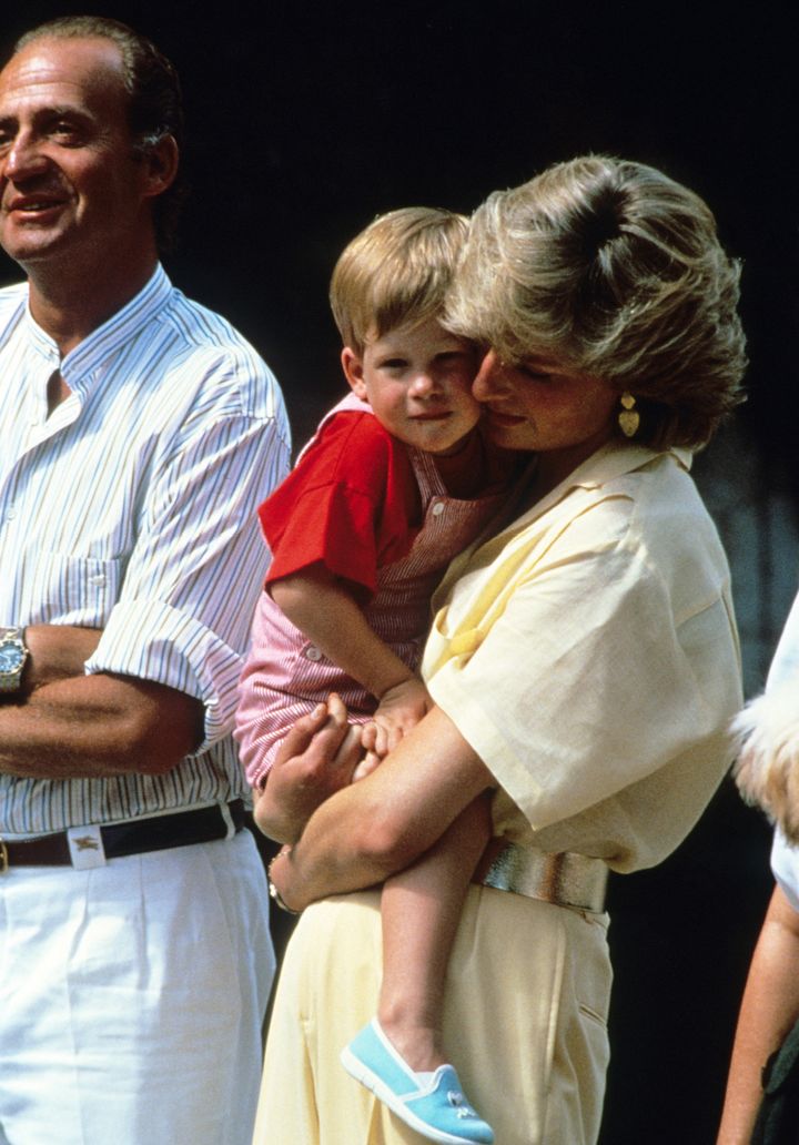 Diana, Princess of Wales, holds Prince Harry, aged 2, in 1987