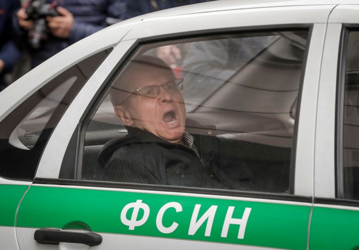 Ex-Russian economy minister Alexei Ulyukayev yawns while leaving court earlier this month