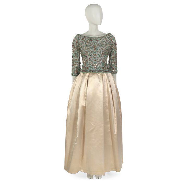 <p>Sarmi: Evening dress of silk embroidered with beads and satin, 1961. Worn to the inaugural ball in honor of President John F. Kennedy in Washington, DC, on January 20, 1961. Museum of the City of New York. Gift of Mrs. William Cahan, 1972</p>