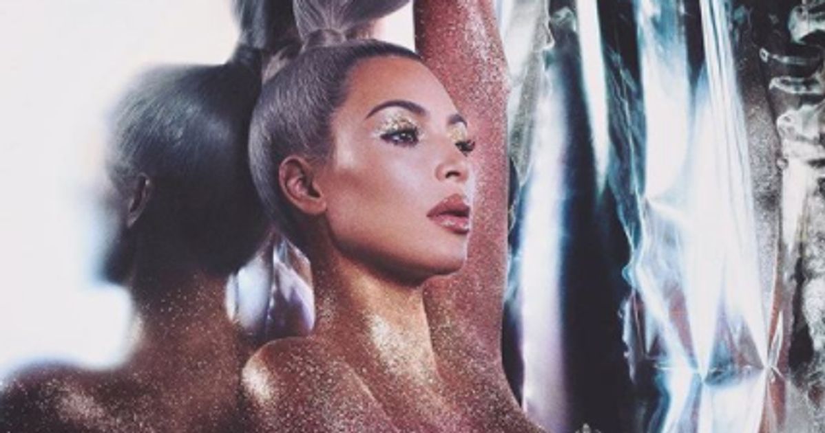 Nude Kim Kardashian Wears Just Gold Glitter To Plug Her Makeup