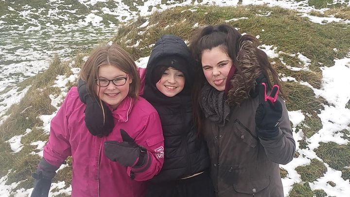 Owen, 13, with his two sisters Gracie, 12, (L) and Tiegen, 15 (R). 