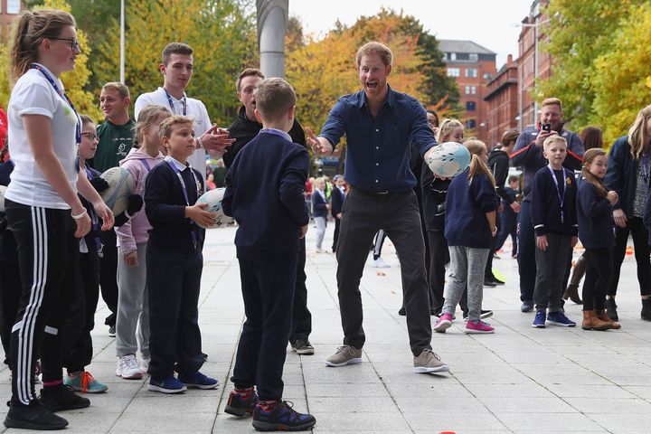  Prince Harry with children from Chetwynd Primary Academy School during a visit to Coach Core at The National Ice Centre on October 26, 2016 in Nottingham, England. The Coach Core apprenticeship scheme was designed by The Royal Foundation of The Duke and Duchess of Cambridge and Prince Harry to take young people aged 16 - 24 with limited opportunities, and train them to be sports coaches and positive role models and mentors in their communities.