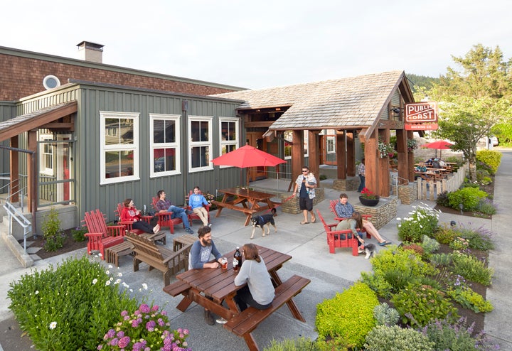 <p>Locals and visitors relaxing at Public Coast Brewery.</p>