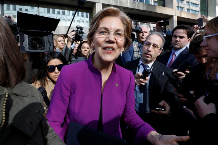 Sen. Elizabeth Warren (D-Mass.) speaks to reporters after a rally in support of the Consumer Financial Protection Bureau's independence.