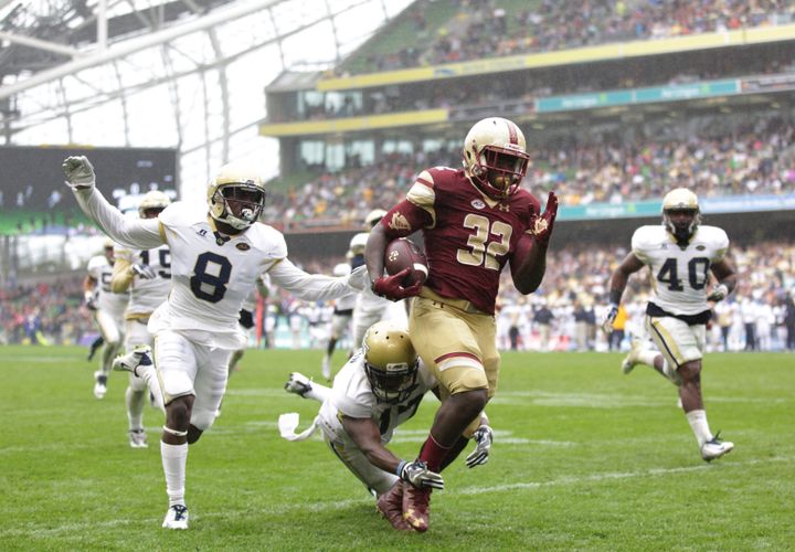 Lance Austin and Step Durham pursue a Boston College ball carrier during a 2016 game.