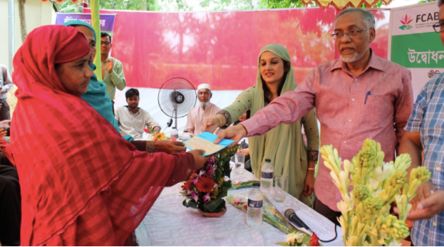 Moushumi Khan (in green) at a Charitable Activities event, the Jeebika - Livelihood and Human Development program, where fami