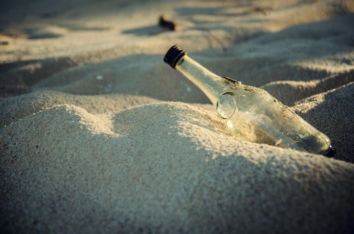 Discarded glass bottle.