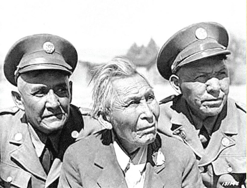 <em>Army code talkers (left to right) Cpl. Jim Lane, Cpl. John Rope and Cpl. Kassey Y-32 pose for a photo at Fort Huachuca,