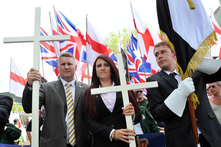 Jayda Fransen (center) joins a Britain First protest march on June 27, 2015, in Luton, England.