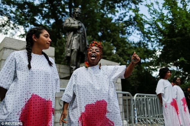 <p>Rossanna Mercedes of Black Youth Project 100: “Memorializing of imperialist slaveholders, murderers and torturers like J. Marion Sims is white supremacy.”</p>