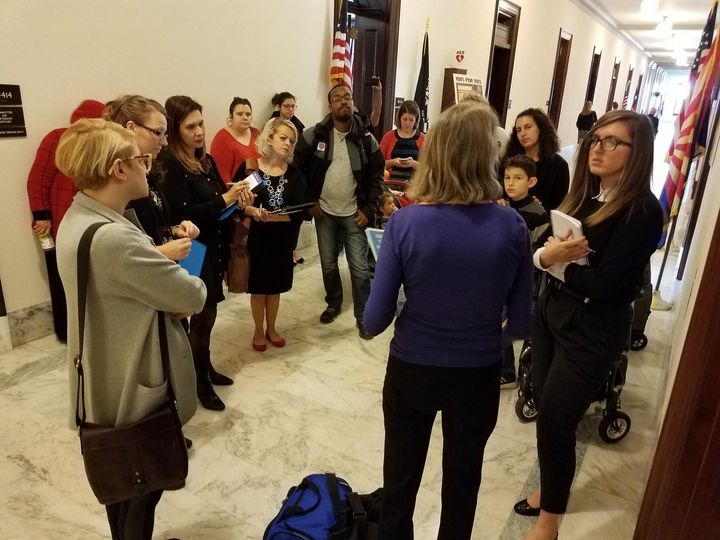 Moms Rising and Little Lobbyists members meeting with a member of Republican Senator Jeff Flake’s office.