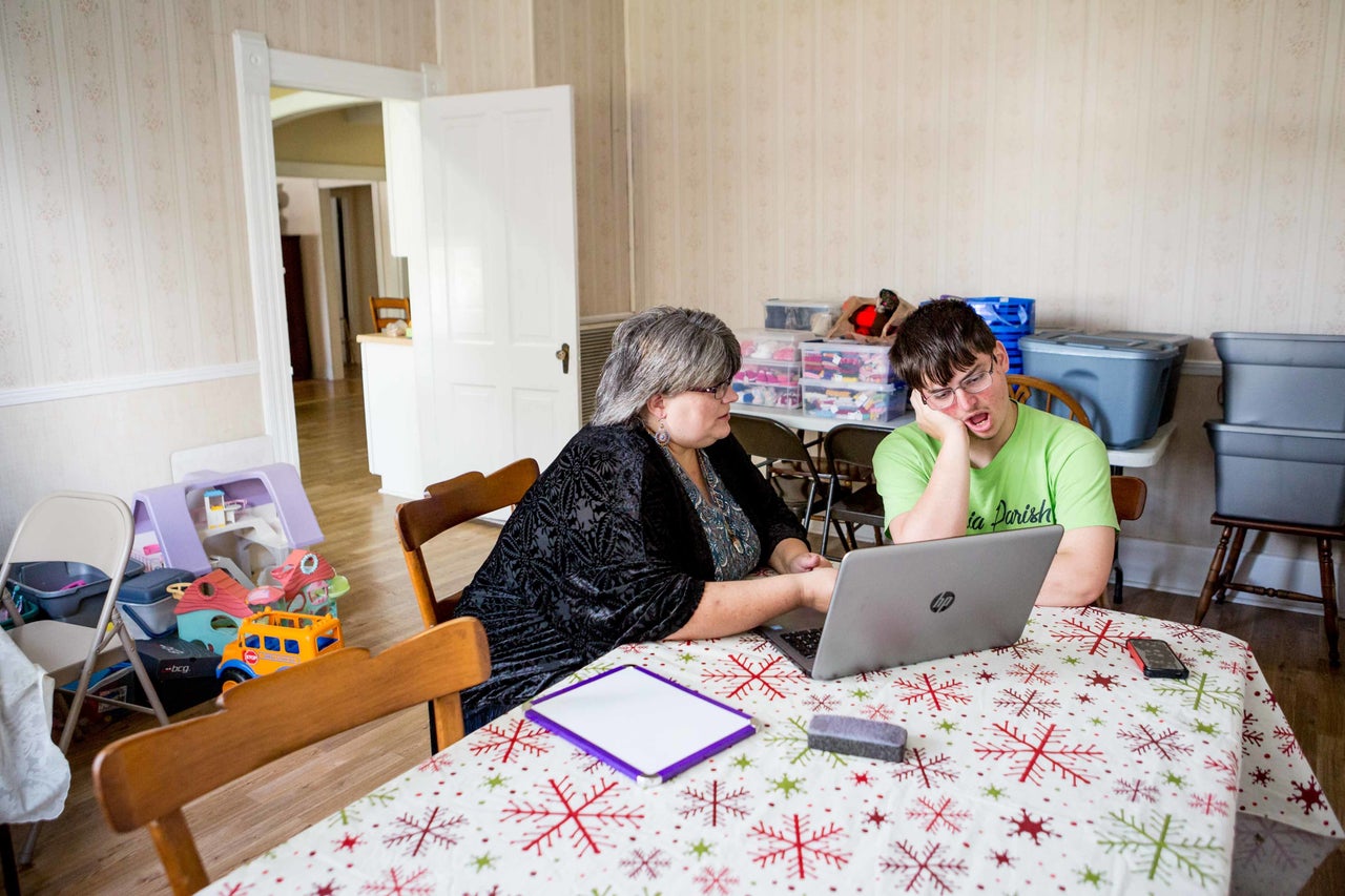 Julie Comeaux and son Matthew begin their home-schooling lesson for the day. Matthew has been home-schooled for the last year.