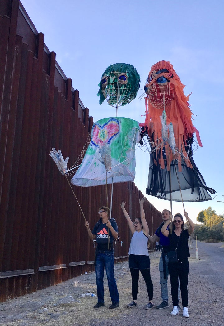 Artist Puppetistas on the U.S. side of the Border Wall