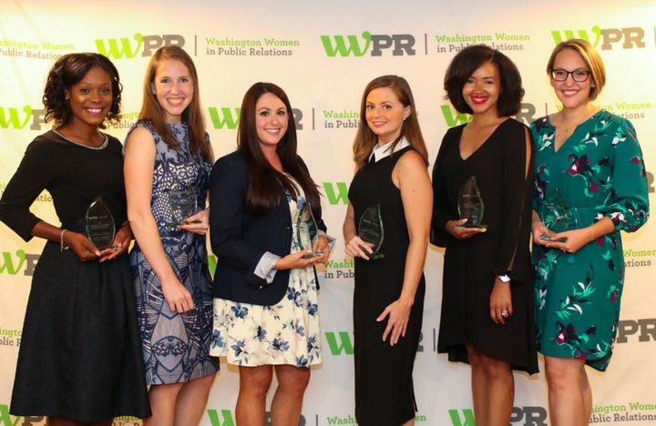 Jenna Boyer accepting the 2017 Emerging Leaders Award from the Washington Women in Public Relations (l-r) Antonice Jackson, Tamara Moore, Alex Thompson, Amanda Byrd, Jenna Boyer, and Jessica Zetzman