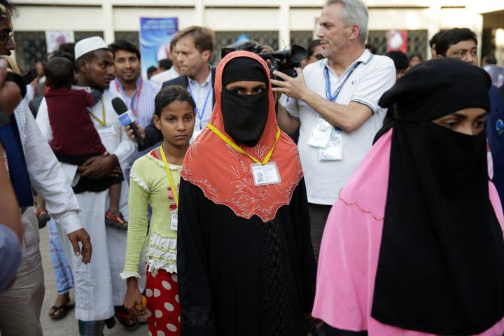 A group of Rohingya refugees arrive at the archbishop's residence during a visit by Pope Francis in Dhaka, Bangladesh, on Dec