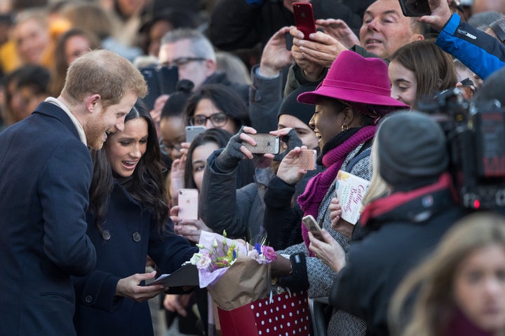 We imagine the card says, "Congrats, Megs and Harry! I haven't been this excited about an engagement since my own."