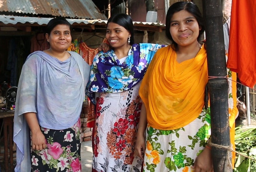 From left to right: Lipa, Shormila, Shipra sisters who learned how to sew and start a business through the organization BRAC.