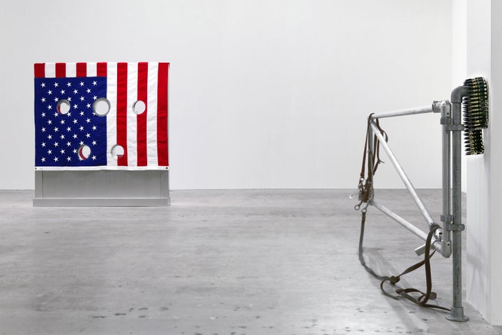 <p>Installation view of <em>Kinetics of Violence: Alexander Calder + Cady Noland</em>, curated by Sandra Antelo-Suarez, Venus Over Manhattan, 2017. Left: Cady Nolan, frontal view of <em>Gibbet (in 2 parts</em>), aluminum, wood and fabric, 153 x 142.9 x 20.3 cm. (60.2 x 56.3 x 8 in.). Private collection. Foreground: Cady Nolan, partial view of <em>Corral Gates</em>, 1989, pipes police straps, cattle straps. Collection Fondazione Sandretto Re Rebaudengo, Torino. Private collection.</p>