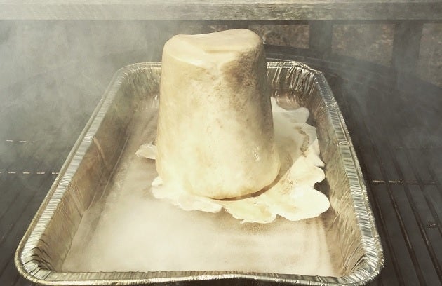 <p>Smoke-roasted ice cream, action shot.</p>