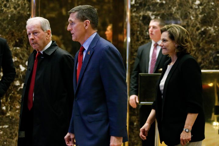 Robert. C. 'Bud' McFarlane, Michael Flynn and KT McFarland walk in the lobby at Trump Tower in New York on Dec. 5, 2016.