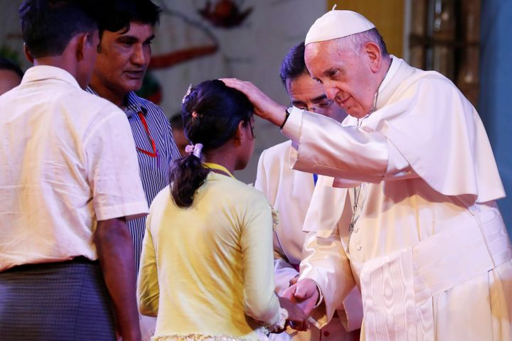 Pope Francis meeting a Rohingya refugee in Dhaka, Bangaldesh on Dec. 1, 2017.