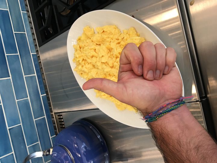 <p>Thumbs up for my husband’s scrambled eggs. </p>