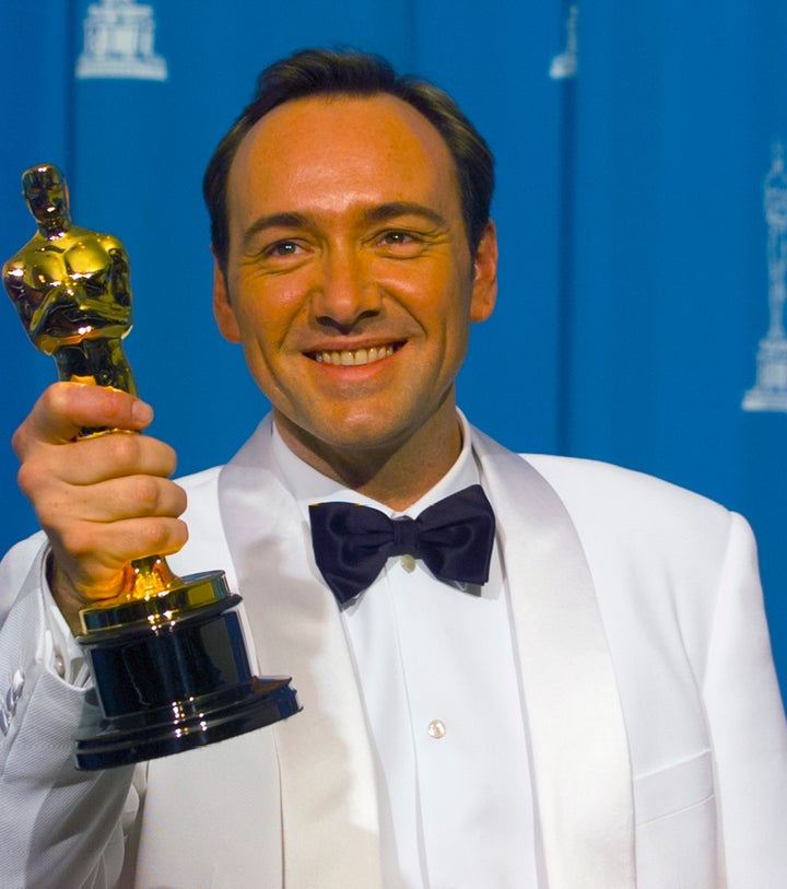 Spacey holds his Oscar for best supporting actor for "The Usual Suspects," March 25, 1996.