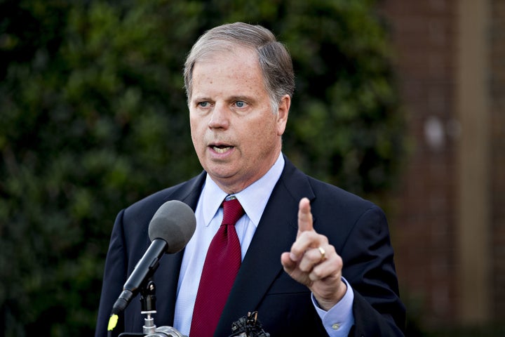 Democratic candidate Doug Jones takes aim at Roy Moore in the final week of the campaign.