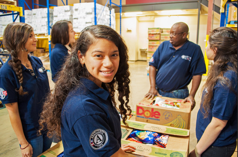AmeriCorpsVISTA volunteers work at an Austin, Texas, food bank.