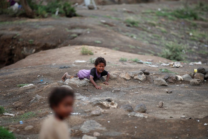 A boy cries at a camp for displaced people near the Yemeni capital of Sana'a on Aug. 10, 2016.