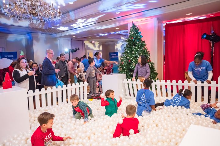 Military kids enjoy some fun and games at Winter Wonderland Holiday Party.