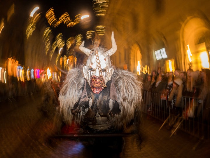 A celebrant gets into the Krampus spirit in Graz on Dec. 3, 2017. 