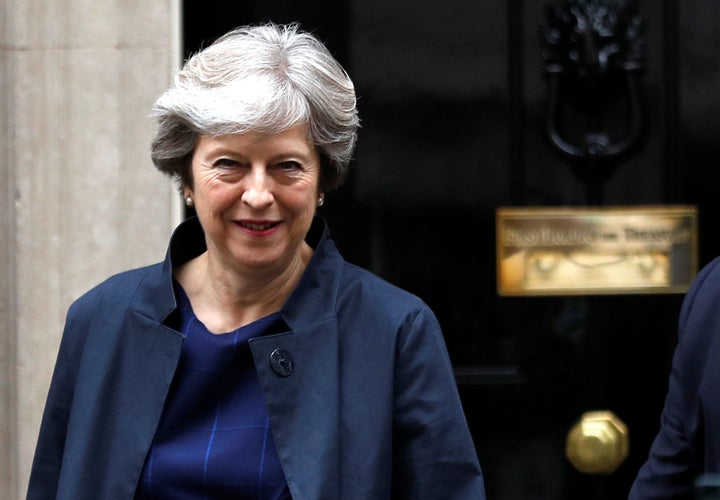 Britain's Prime Minister Theresa May leaves 10 Downing Street in London on Oct. 19, 2017. Two terror suspects allegedly