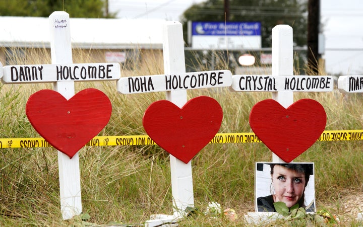 A line of crosses memorializes some of the victims of the Sutherland Springs shooting.