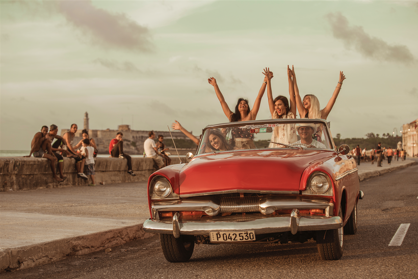 Havana Reverie clients enjoying themselves on the malecón.