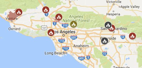 A map of the fires surrounding Los Angeles Wednesday morning. Red and yellow icons indicate a fire that's actively burning. A gray icon marks a fire that's 100 percent contained.