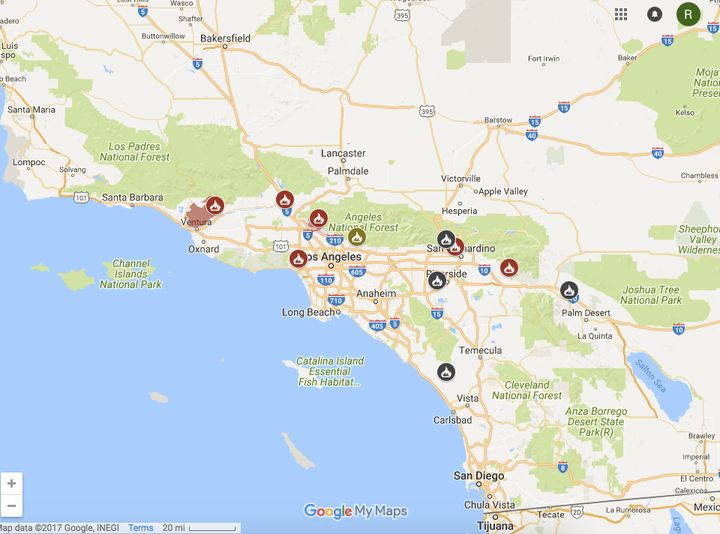 A map of the fires surrounding Los Angeles Wednesday morning. Red and yellow icons indicate a fire that's actively burning. A gray icon marks a fire that's 100 percent contained.