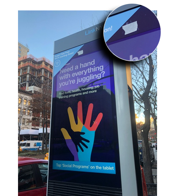 LinkNYC camera’s being obscured by adhesive Post-it notes. 