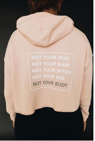 <p>Not Your Body cropped hoodie.</p>