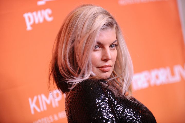 Fergie says her "freeing moment" happened during a paranoid episode in church.