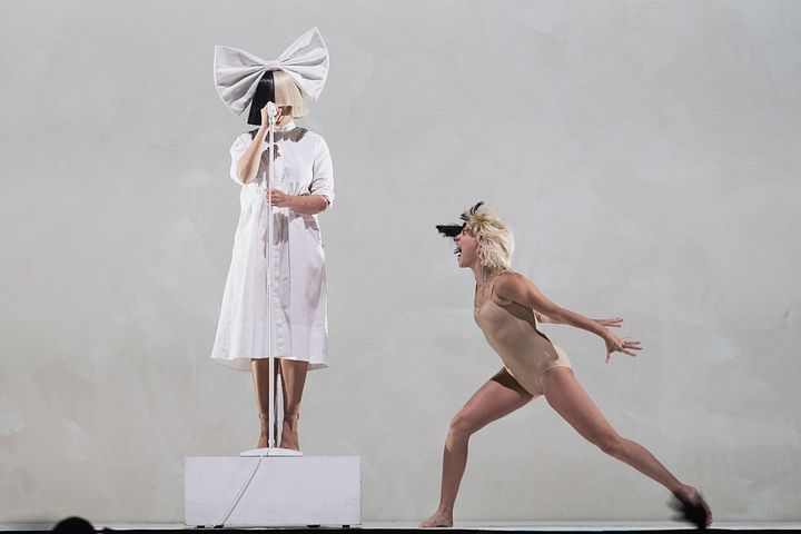 Sia and Maddie Ziegler perform on stage during the opening night of her 'Nostalgic for the Present' tour at KeyArena on September 29, 2016 in Seattle, Washington.