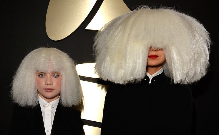 Dancer Maddie Ziegler (L) and singer/songwriter Sia attend The 57th Annual GRAMMY Awards in 2015.