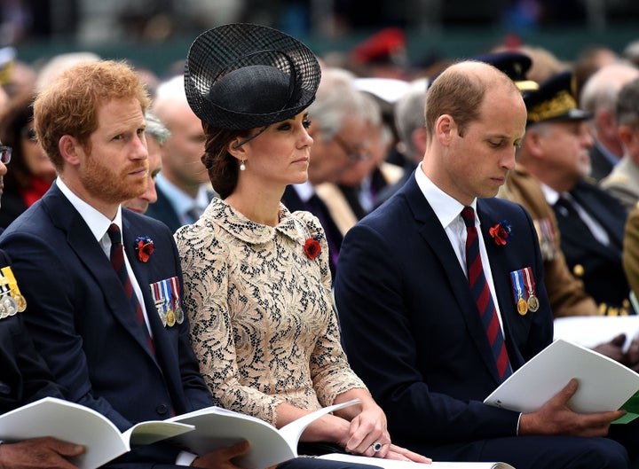 Prince Harry sits with his brother and sister-in-law during a commemoration of the Battle of the Somme in July 2016.