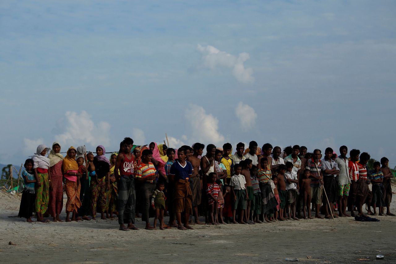 Rohingya refugees wait to cross the border into Bangladesh on Nov. 12, 2017.