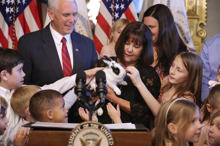 Vice President Mike Pence and his wife Karen let children pet their rabbit Marlon Bundo, whose book will be out in March 2018.