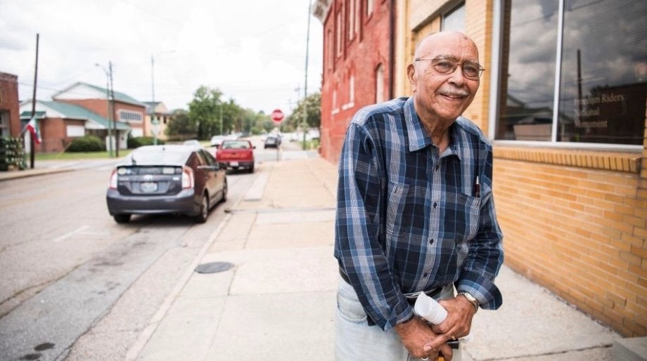 Edward Wood, 90, stands outside the Greyhound bus station in Anniston, Alabama.