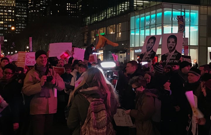 Net neutrality supporters gather at a rally in front of a Verizon store on 42nd Street in New York City on Dec. 7.