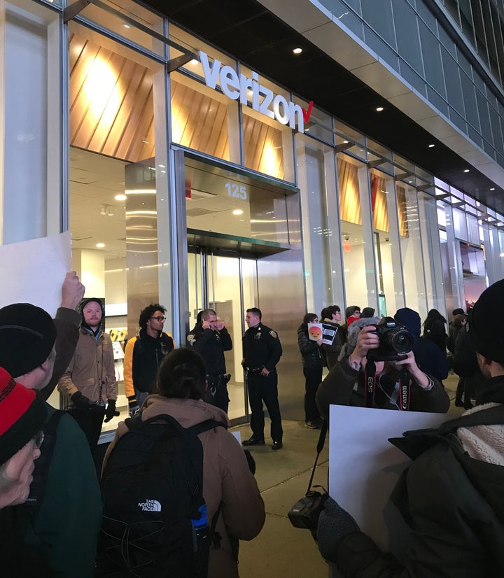 Net neutrality supporters gather at a rally in front of a Verizon store on 42nd Street in New York City on Dec. 7.